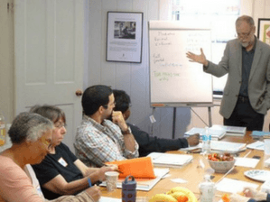 instructor leading mediation training