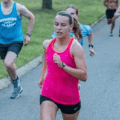 Female runner completing a race