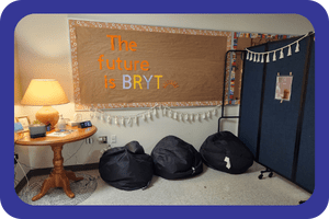Bryt room with bean bags and a bulletin board with the words "The Future is Bryt"