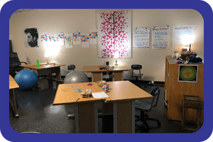 Bryt room with desks and yoga balls. 